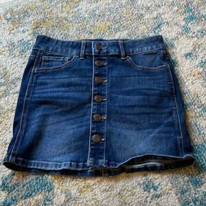 Kids jean skirt size 10 worn. In very good condition.